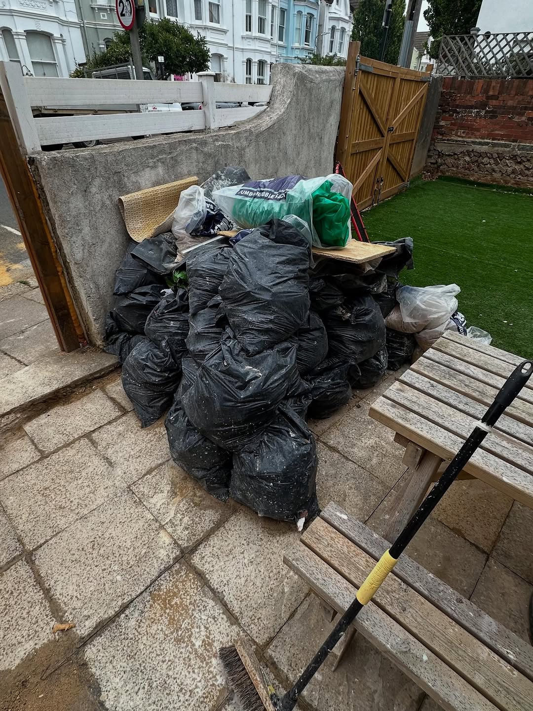 Black bin bags collected from Brighton residential property