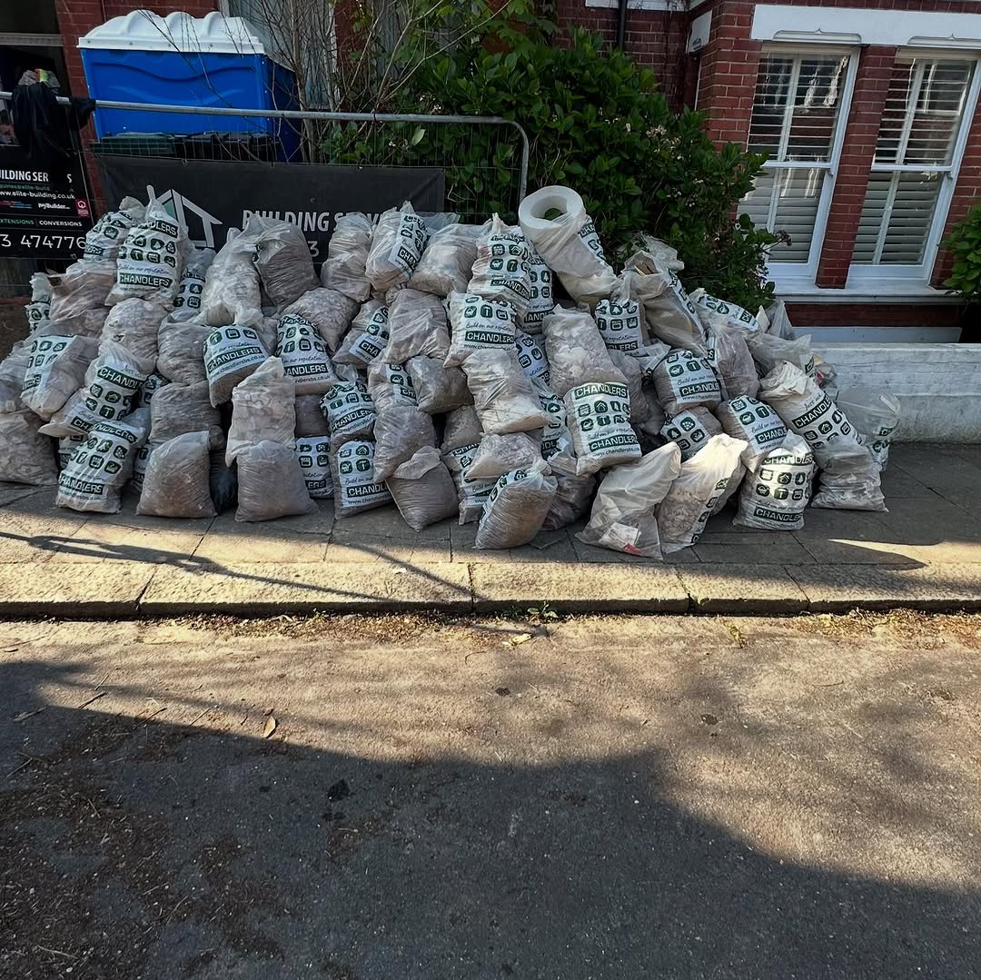 Large rubble bags on a pavement ready for construction waste removal